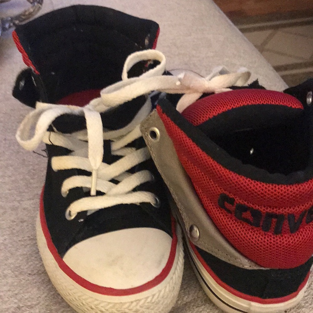 All Star Converse style shoes.  Youths 3